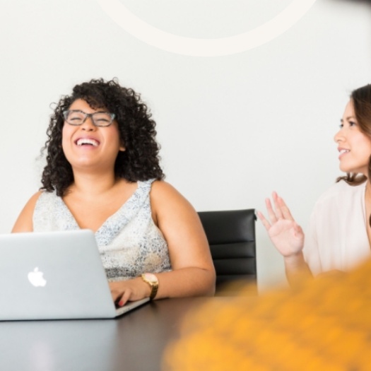 office workers smiling and laughing